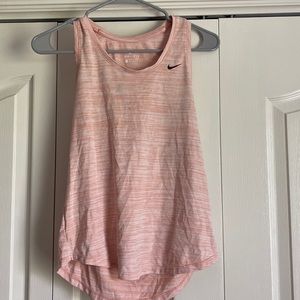 This is a pink Nike running/workout tank top. Size xs
